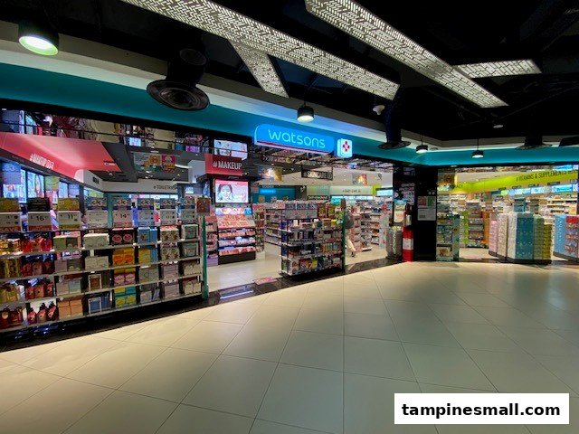 The brightly lit entrance of Watsons Pharmacy, showcasing health, beauty, and wellness products.