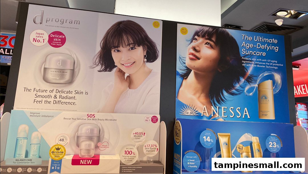 Displays featuring d program skincare and Anessa suncare products with promotional information.
