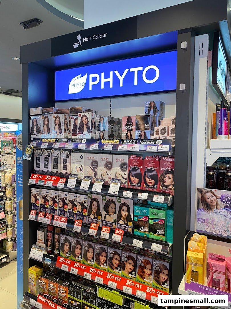 A retail display shelf showcasing a variety of hair color products and brands like Phyto.