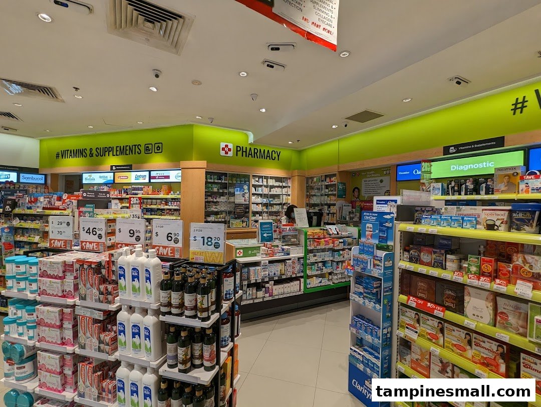 Interior view of Watsons pharmacy, showcasing aisles of health products, vitamins, supplements, and a pharmacy counter.