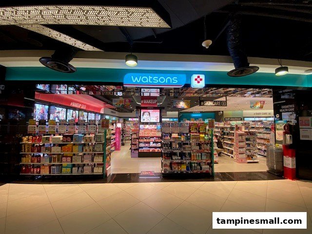 The brightly lit entrance of a Watsons pharmacy and health store, showcasing various product aisles.