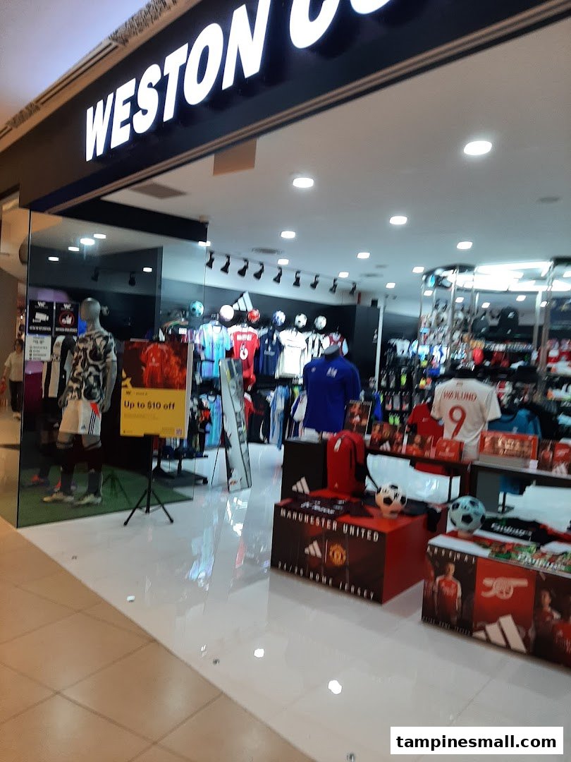 The entrance of Weston Corp, a sports apparel store, showcasing official team jerseys and merchandise.