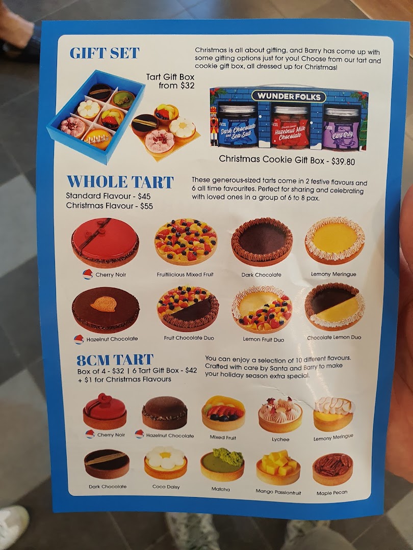 A detailed menu showcasing tarts and gift sets from Wunderfolks Pastry and Coffee.