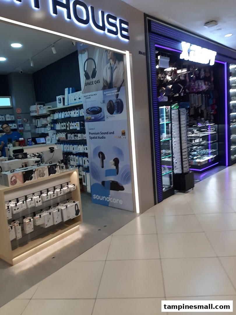 The illuminated entrance of X-Craft, a retail shop specializing in accessories and gadgets.