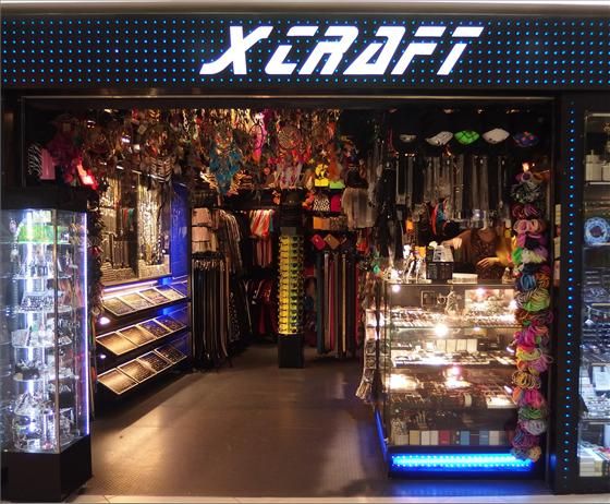 The X-Craft shop entrance, brightly lit, showcasing a wide array of accessories and unique items.