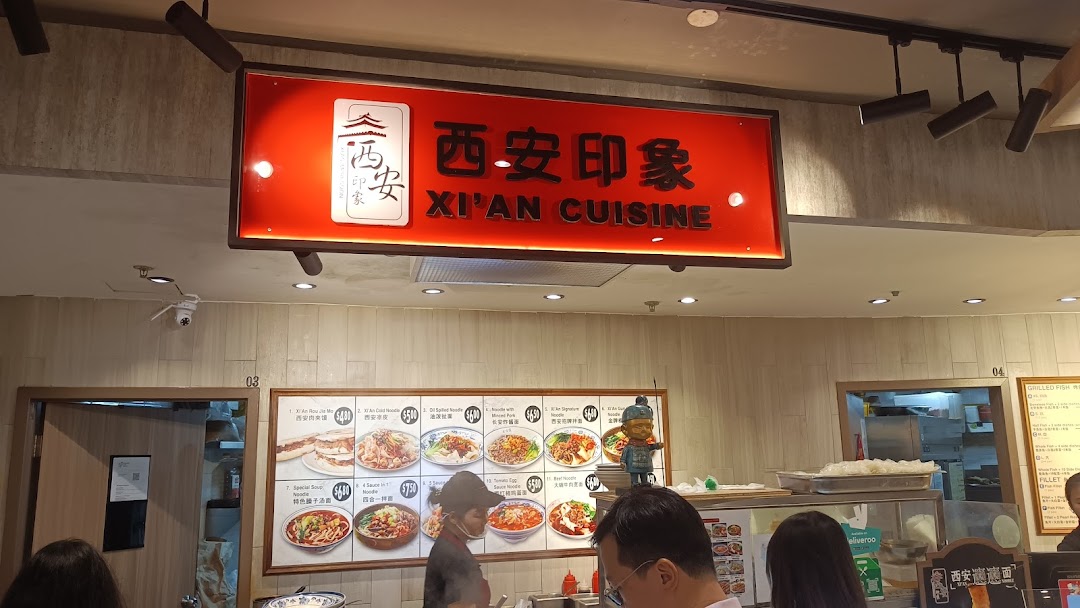 A vibrant menu board showcasing authentic Xi'an cuisine at XiAn Impression food stall.