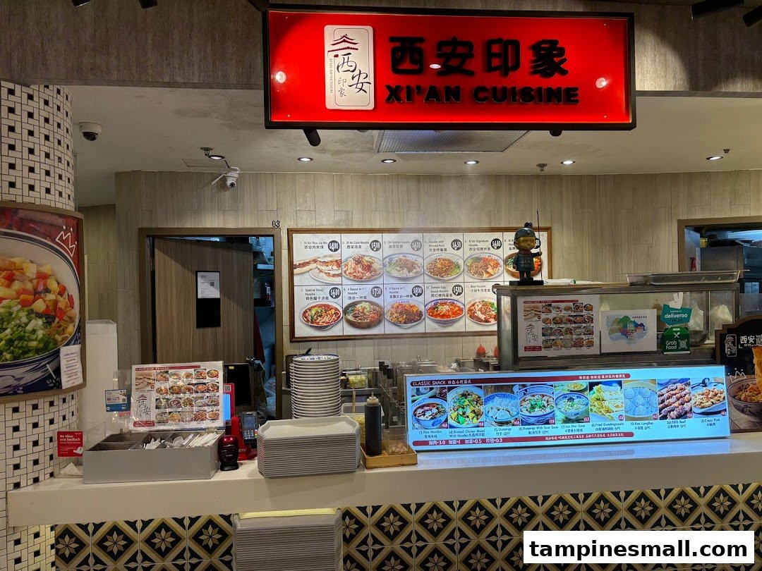 A vibrant counter of Xi'an Cuisine, showcasing their diverse menu boards and inviting setup.