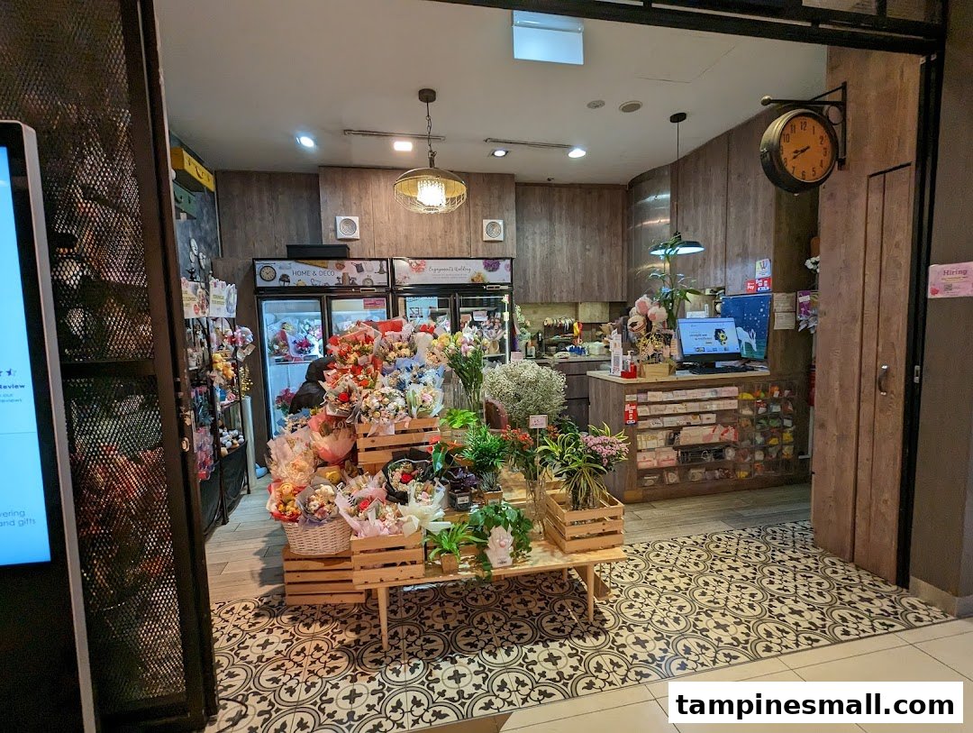 Interior view of Xpressflower, a vibrant shop displaying fresh floral arrangements, plants, and gifts.