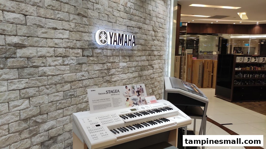 The entrance of Yamaha Music School, featuring a prominent logo and musical instruments on display.