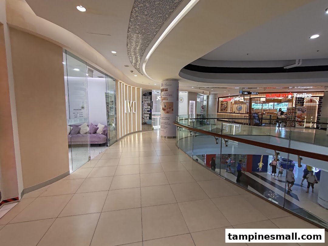 A view of a mall corridor with a shop entrance, representing Yamaha Music School.