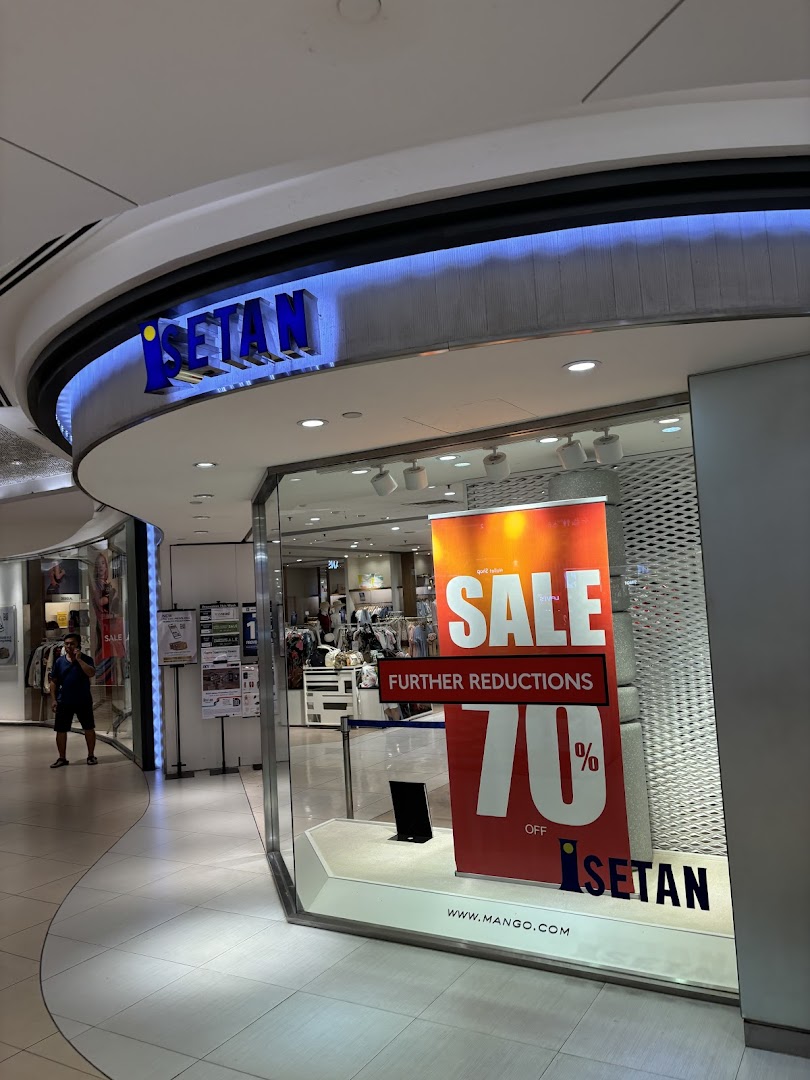 The entrance of Isetan Tampines department store featuring a large 70% off sale sign.