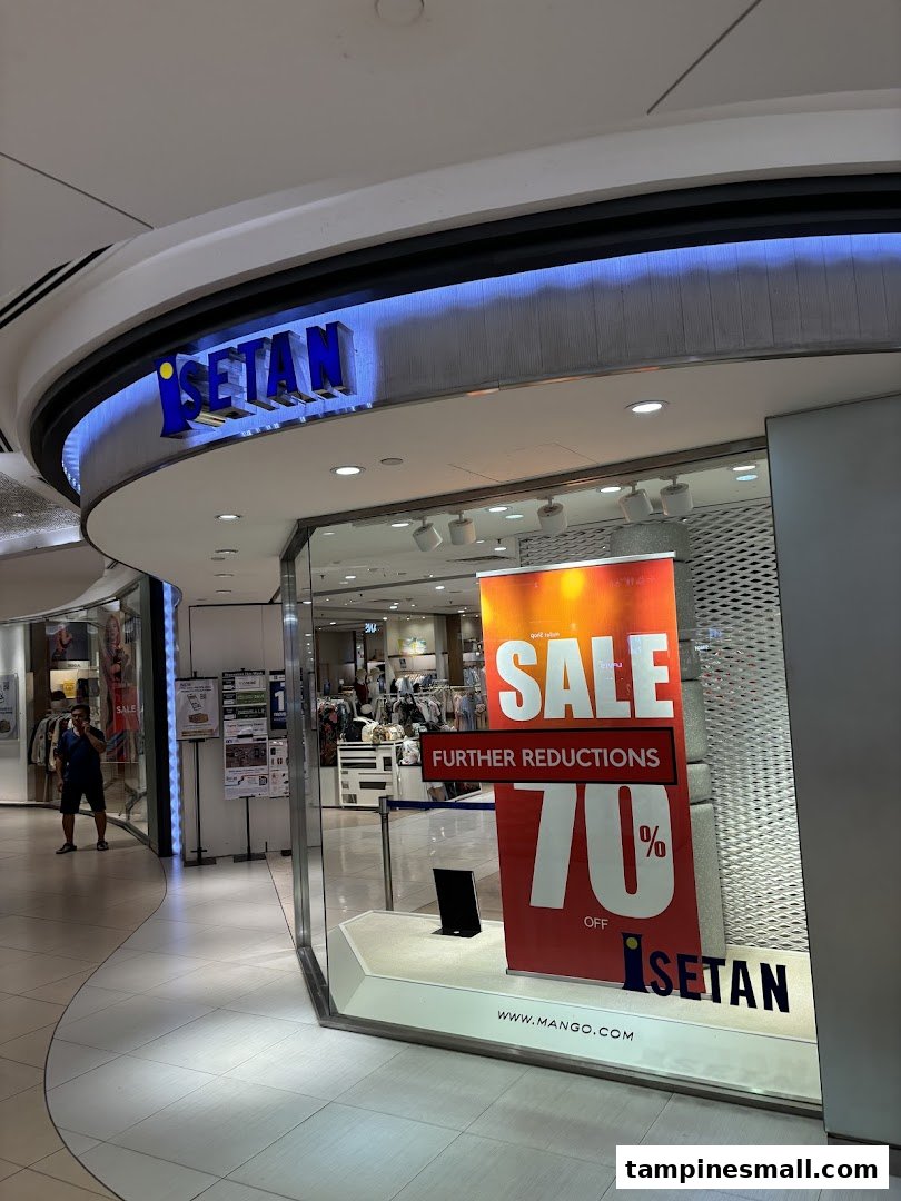 The entrance of Isetan Tampines department store featuring a large 70% off sale sign.