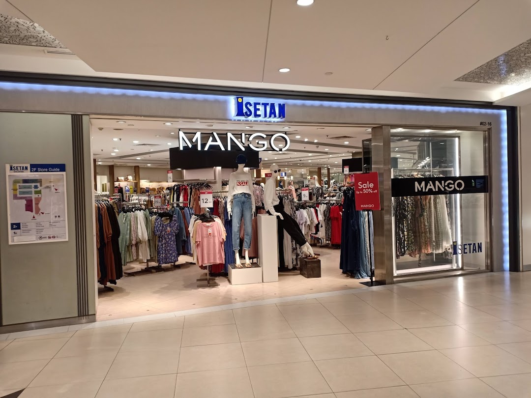 The vibrant entrance of Mango fashion store, showcasing trendy apparel and sale items within Isetan.