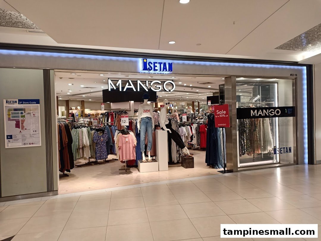 The vibrant entrance of Mango fashion store, showcasing trendy apparel and sale items within Isetan.
