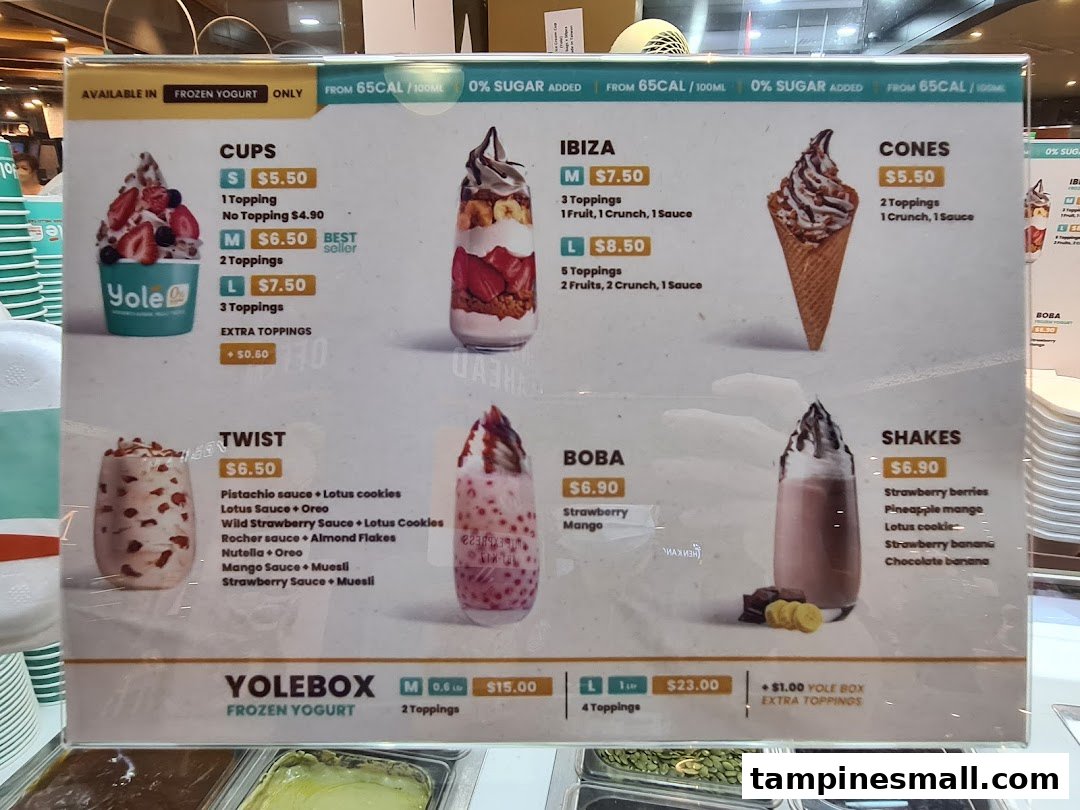 A detailed menu board displaying various frozen yogurt options, prices, and toppings at Yolé.