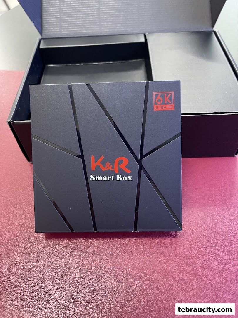 A K&R Smart Box with 6K Ultra HD capability is shown in its packaging.