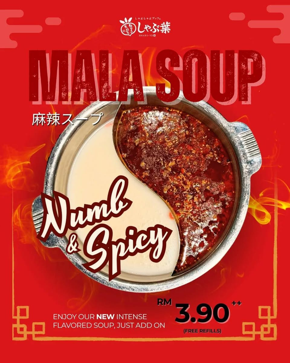 A steaming pot of Shabu-Yo Mala soup with fresh ingredients