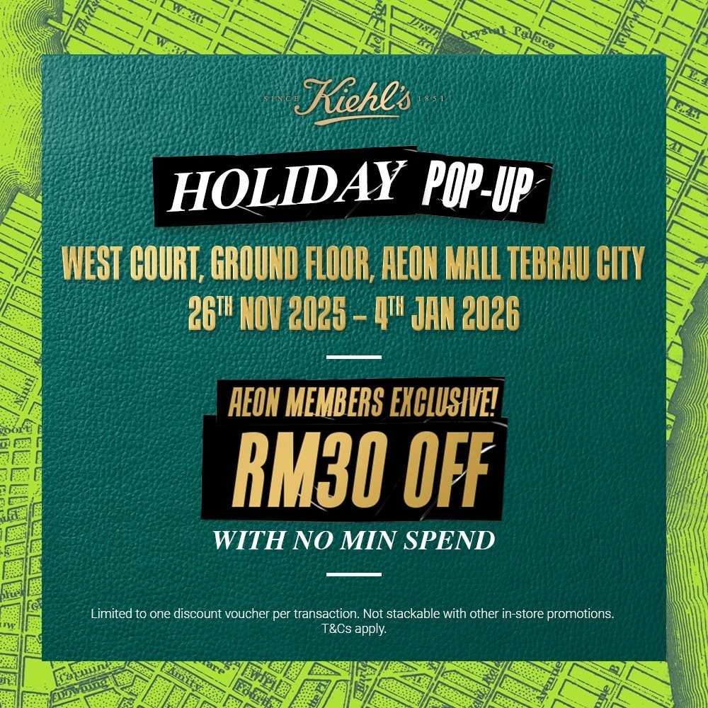 A festive display at the Kiehl's Holiday Pop-Up, showcasing skincare products and decorations.