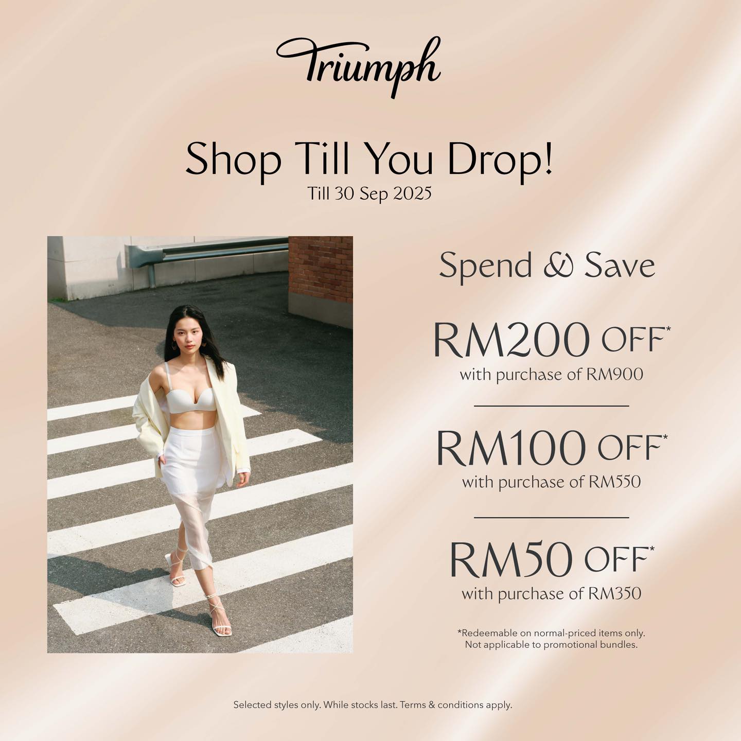 A stylish model wearing Triumph lingerie, looking confident and poised.
