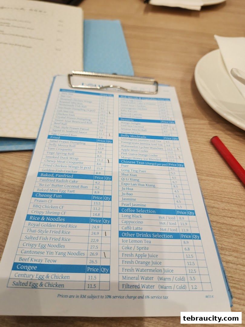 A close-up view of a dim sum menu with various dishes and prices listed.