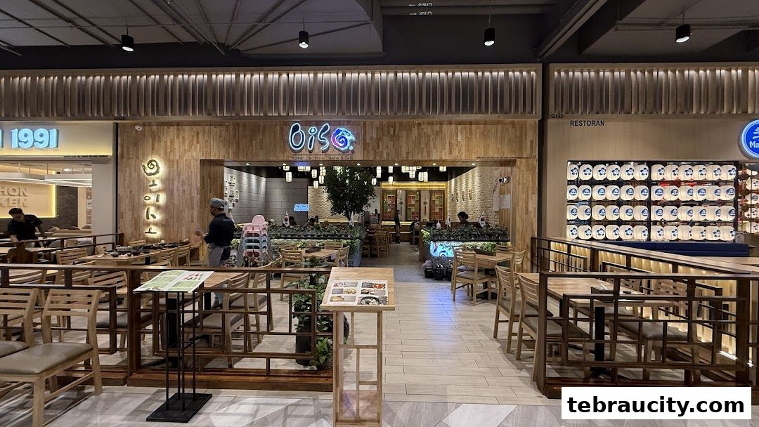 The inviting entrance of Oiso Korean Restaurant with its warm wooden decor and visible seating.