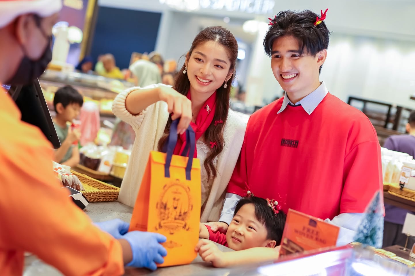 Shoppers enjoying the holiday atmosphere at AEON MALL