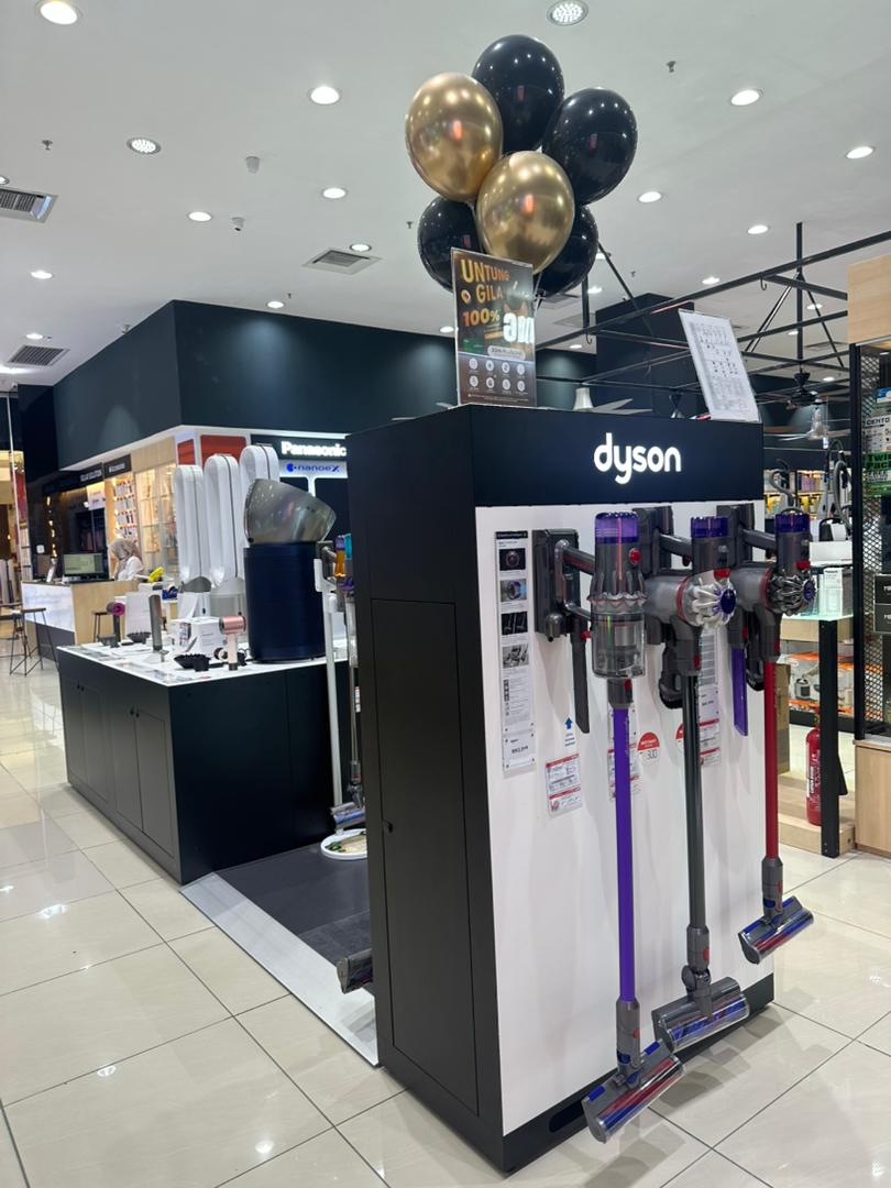Shoppers exploring the upgraded senQ store in AEON Mall Tebrau City