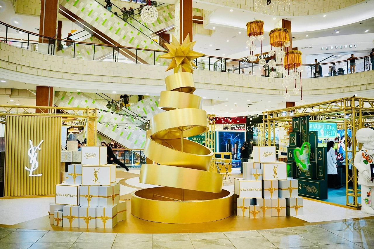 Shoppers enjoying the vibrant atmosphere of the Christmas beauty event