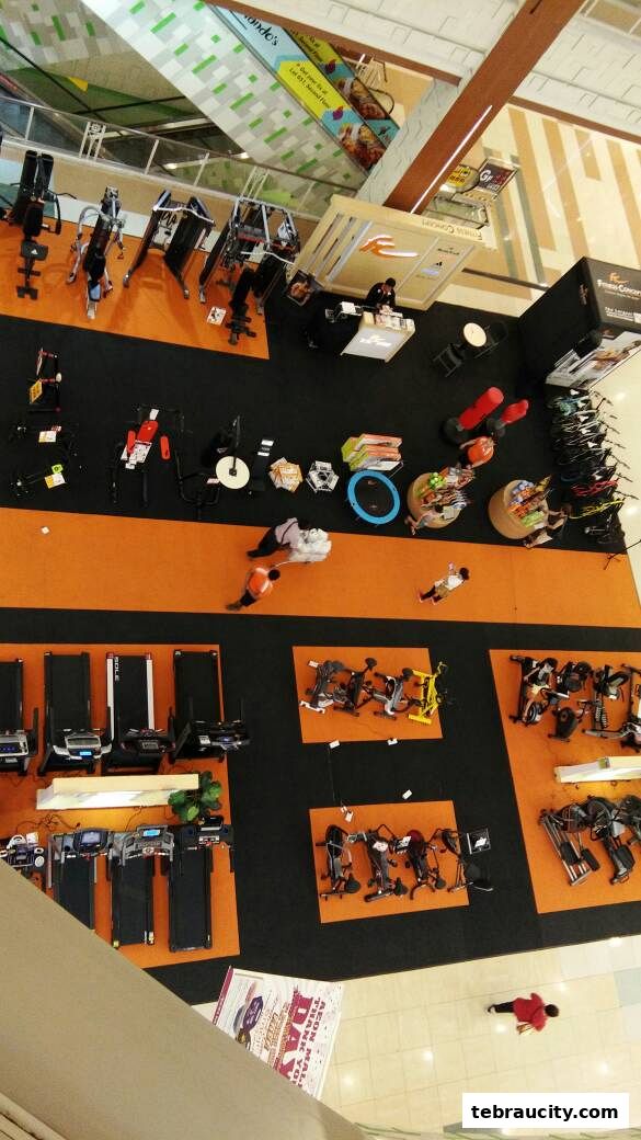 An aerial view of a fitness equipment store showcasing treadmills, exercise bikes, and other gym machines.