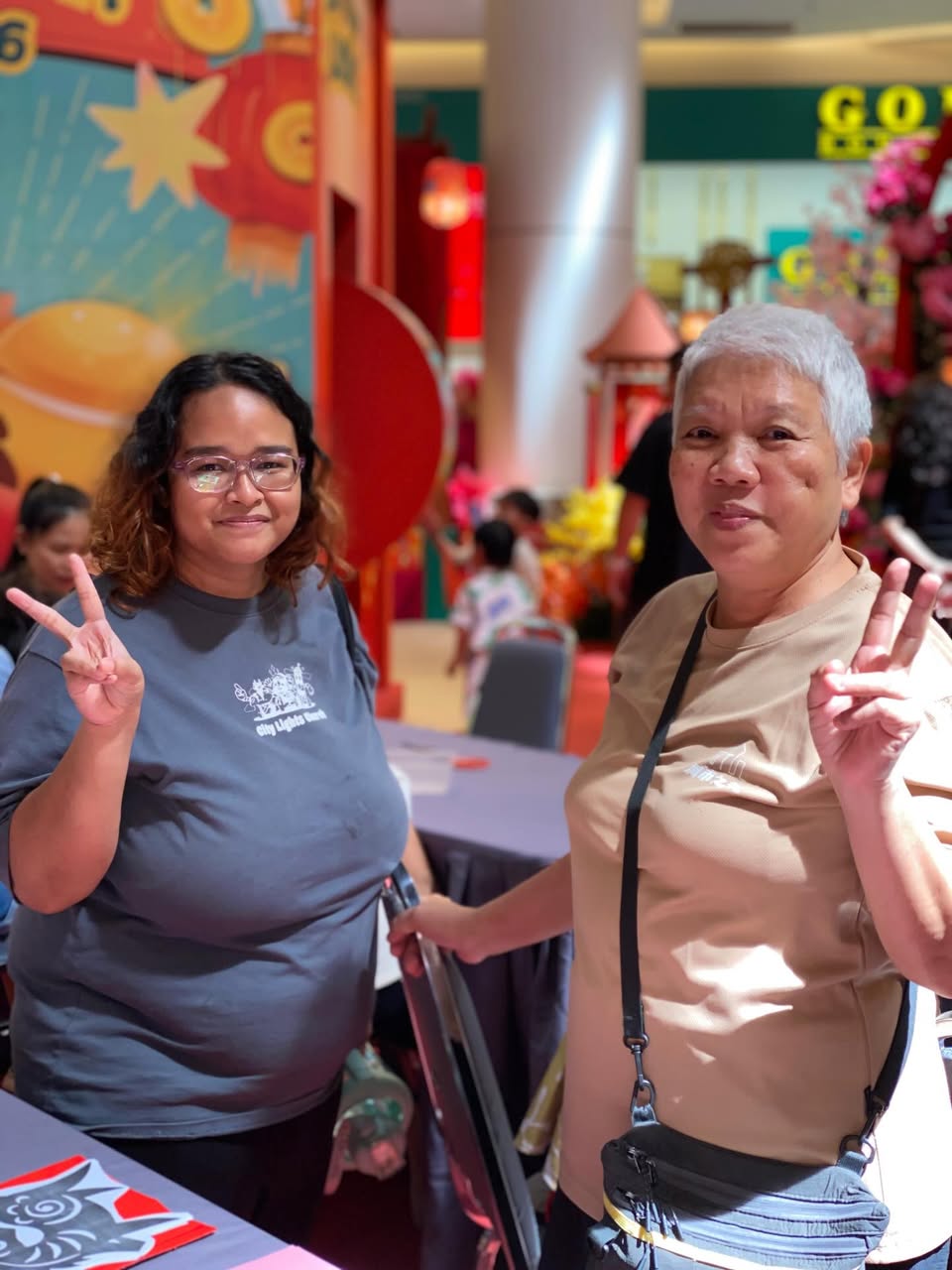 The artist demonstrating the delicate process of paper cutting