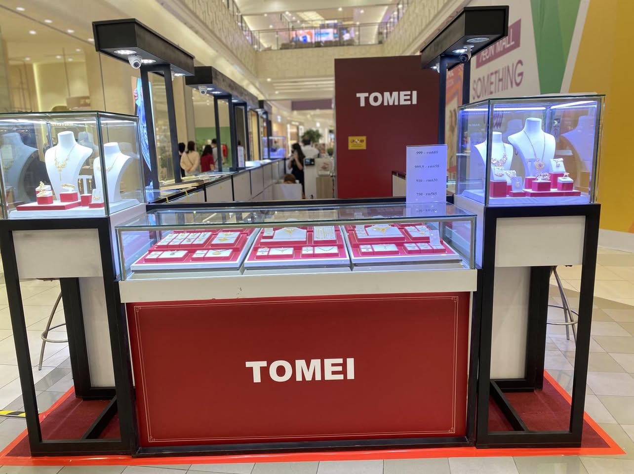 Visitors browsing the latest collections at the TOMEI event