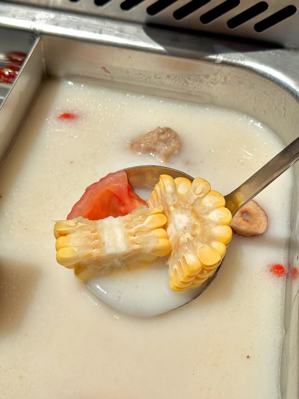 Tender meat on the bone in the hot pot