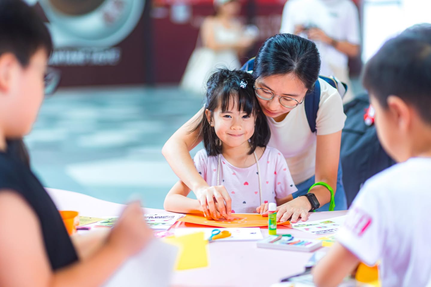 Visitors exploring interactive art installations at WonderLab