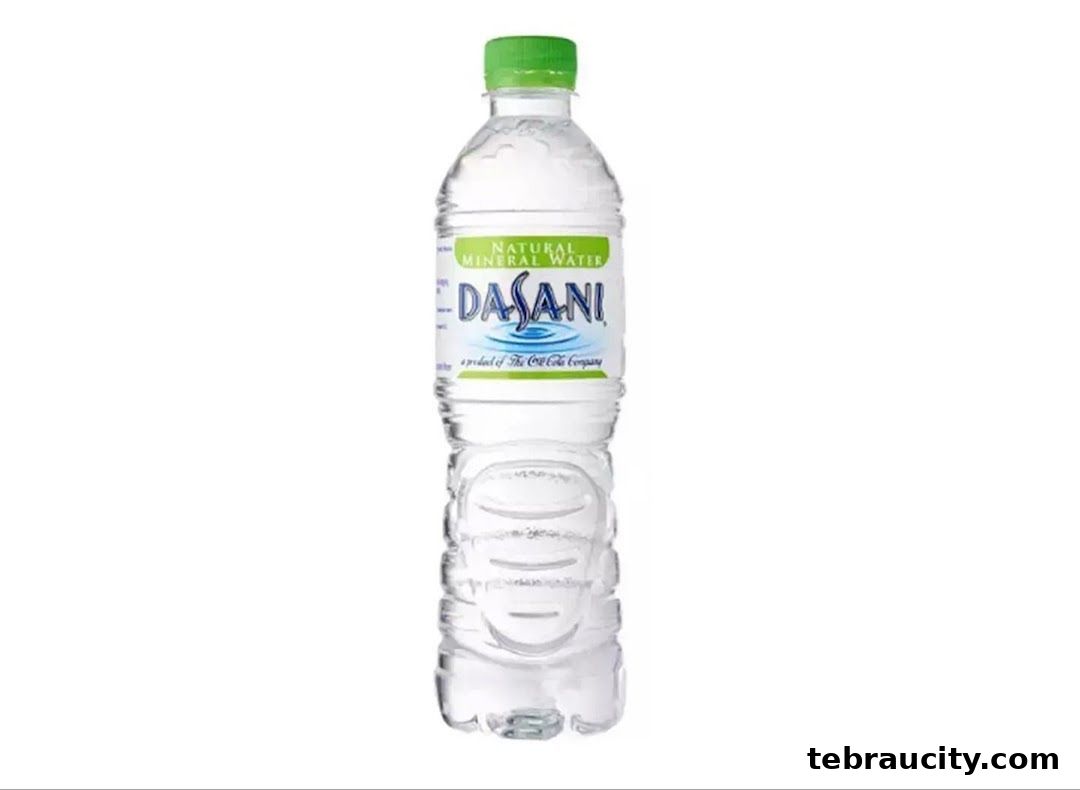 A bottle of Dasani Natural Mineral Water with a green cap.