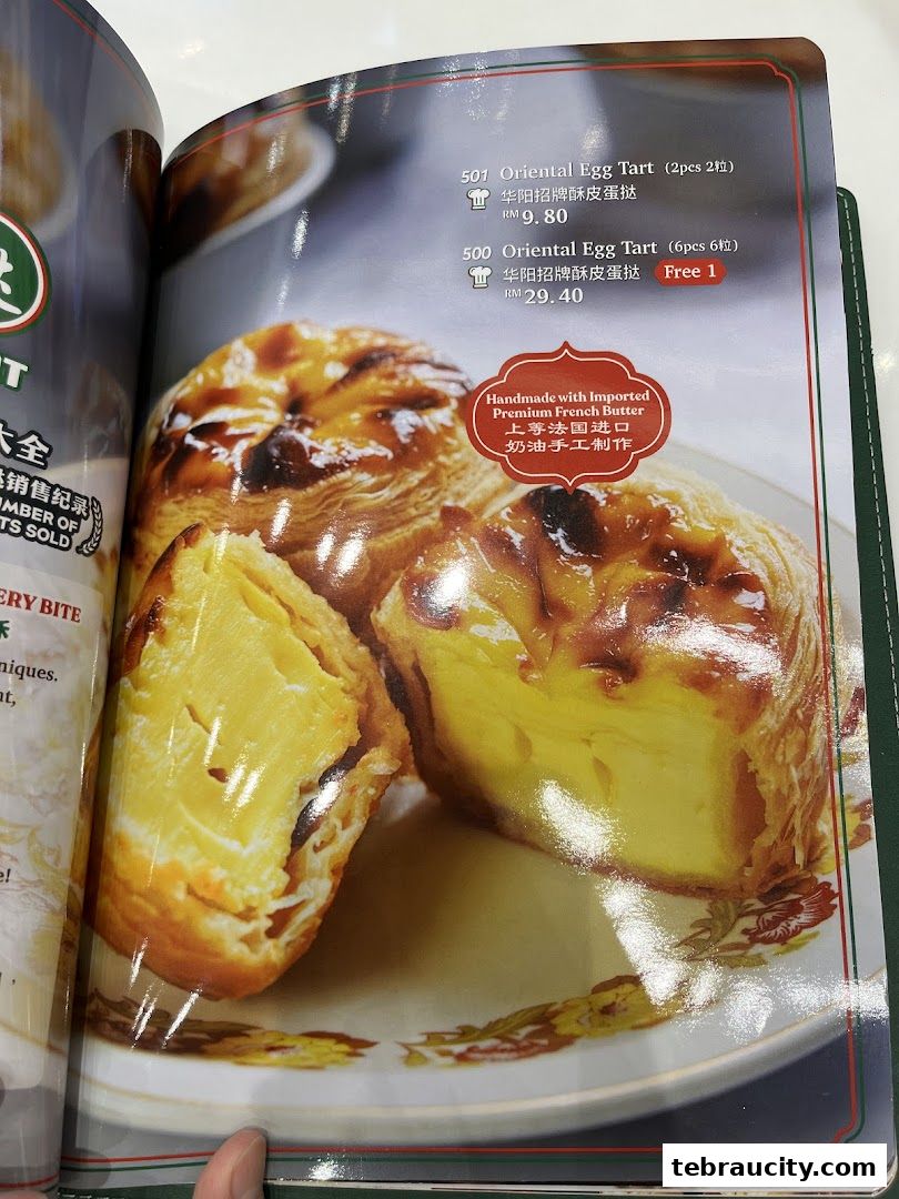 A menu page showcasing Oriental Egg Tarts with prices and descriptions.