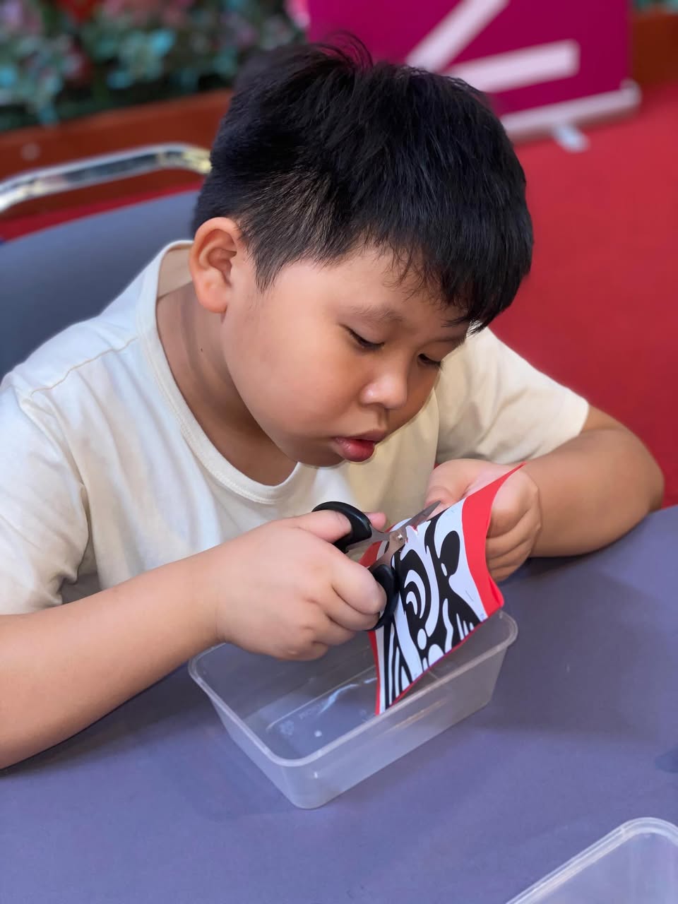 A finished piece of paper art displayed for the audience