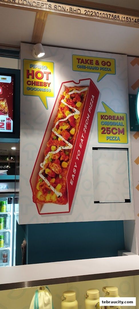 A long pizza with toppings and sauce, advertised as Korean Original.