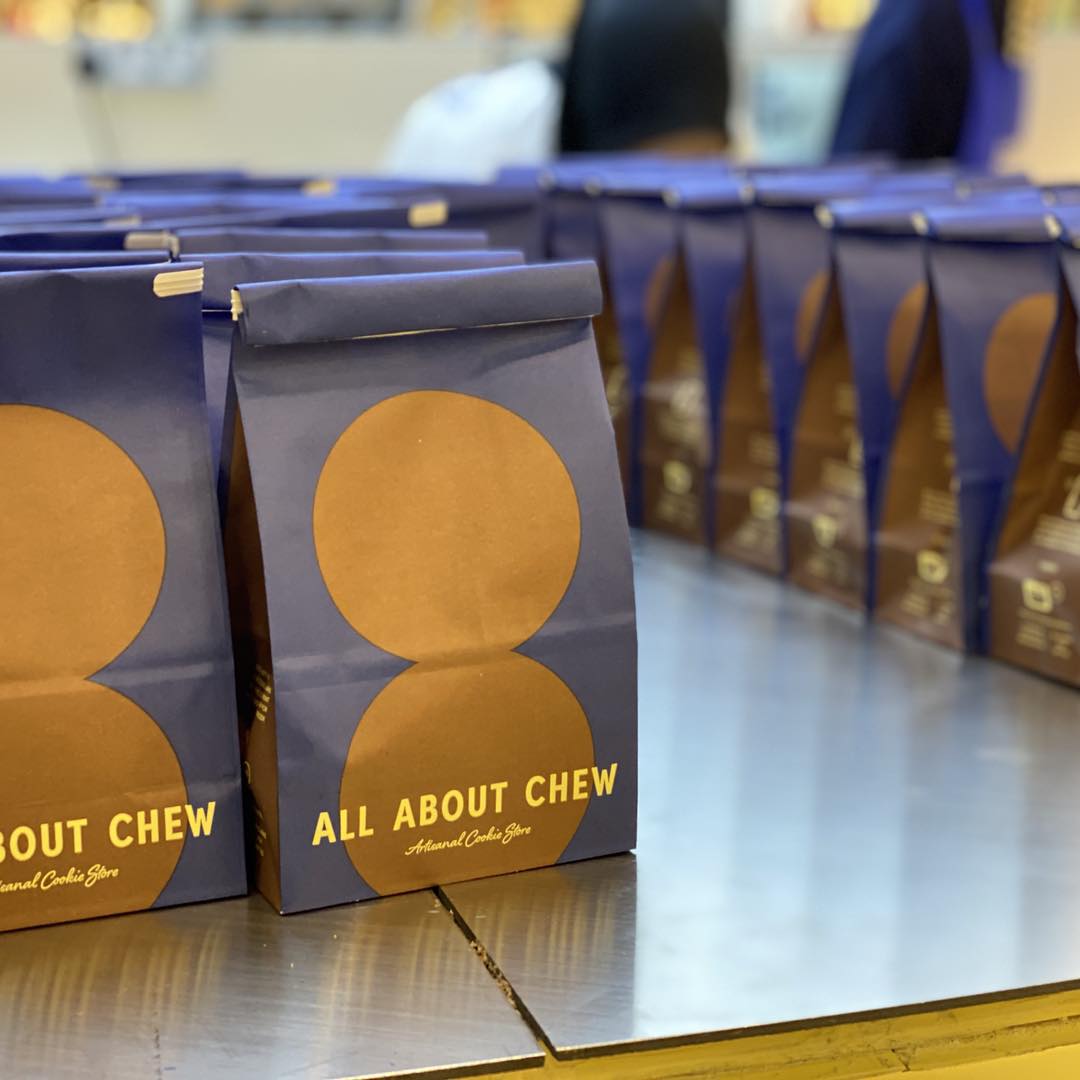 Customers enjoying cookies at the newly opened All About Chew outlet