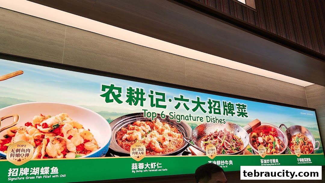 A brightly lit sign showcasing six signature dishes from Nong Geng Ji Hunan Cuisine.