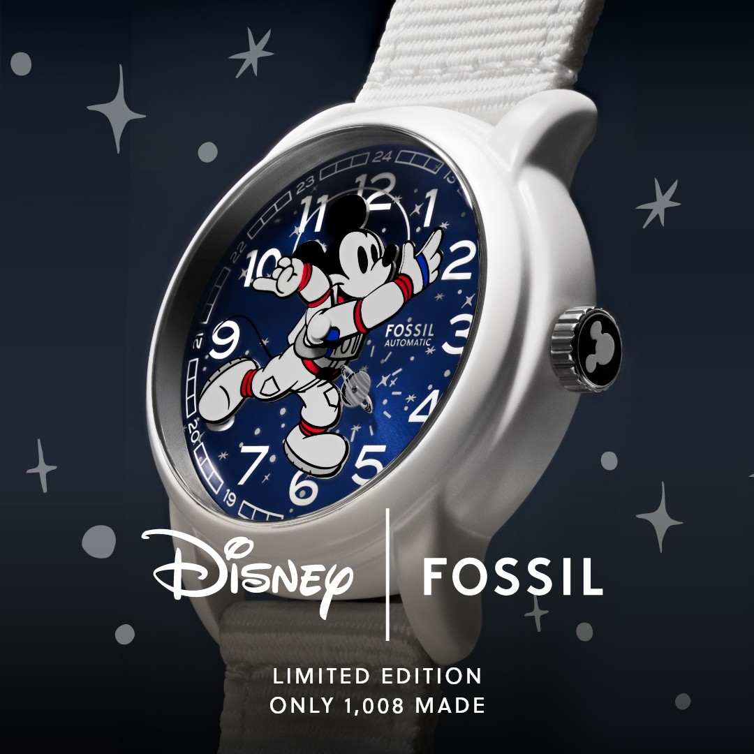 Full view of the Disney x Fossil Heritage automatic watch on a wrist, showcasing the spacewalk Mickey Mouse design