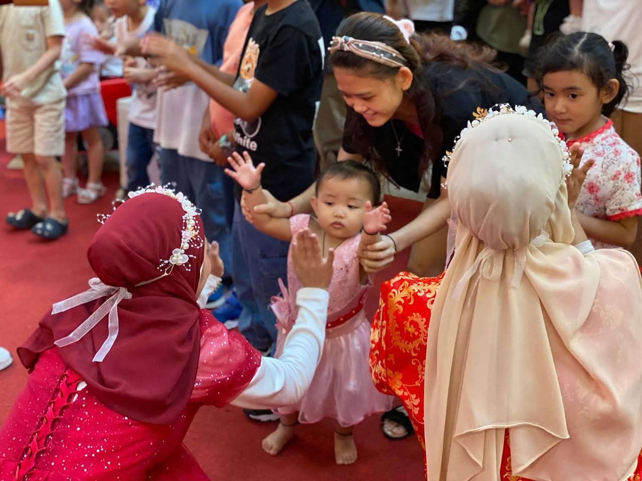 Families and children enjoying the festive parade atmosphere