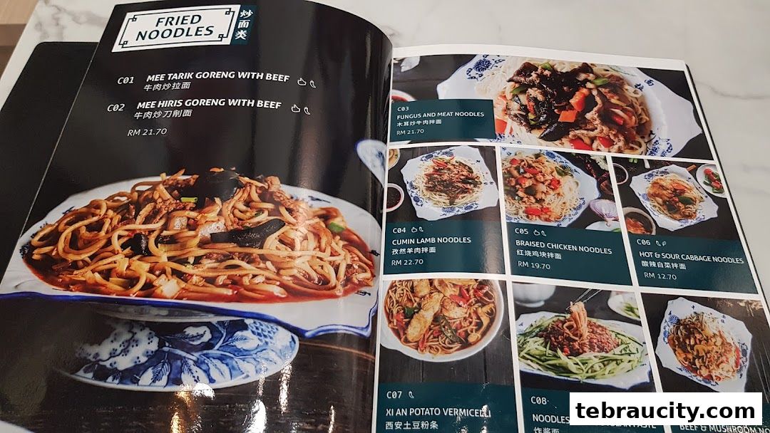 A menu featuring various noodle dishes with accompanying images and prices.