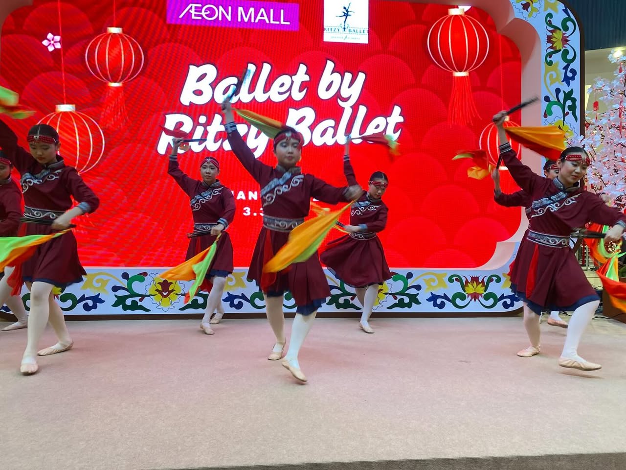 Close-up of ballet shoes highlighting precise footwork.