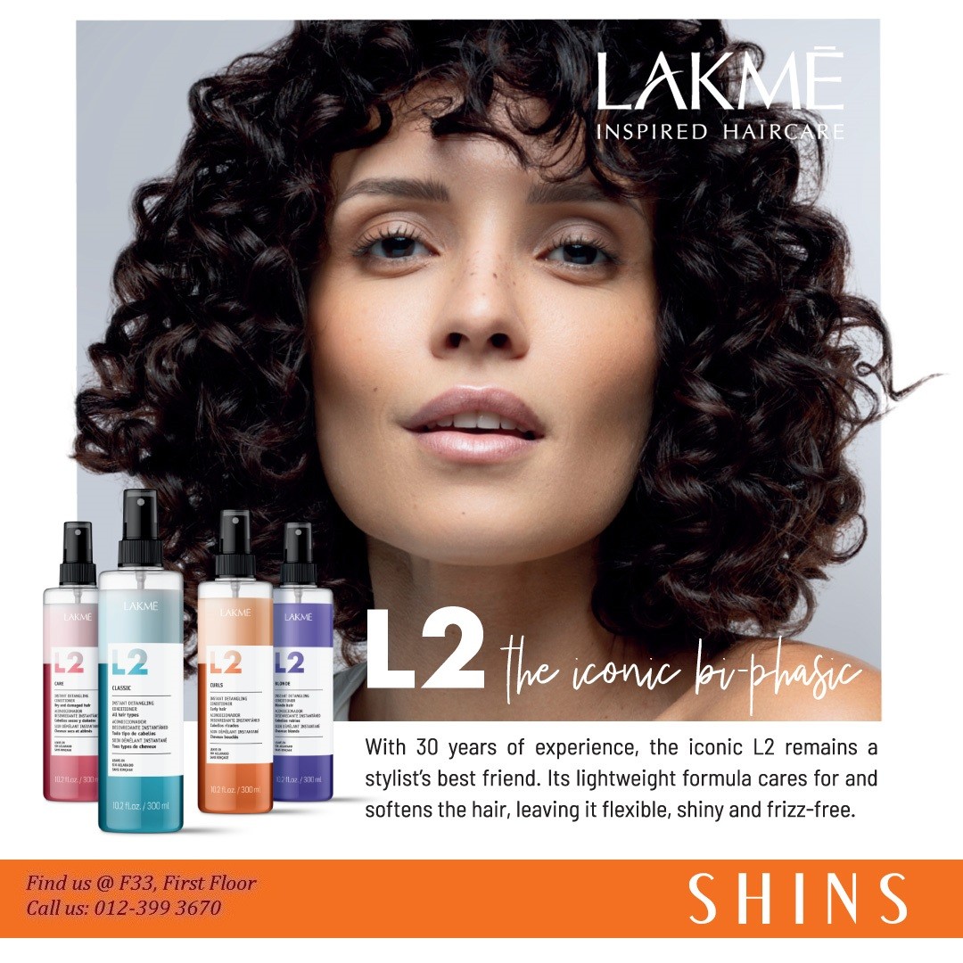 A vibrant display of beauty products and cosmetics, hinting at a celebratory New Year sale at Shins.