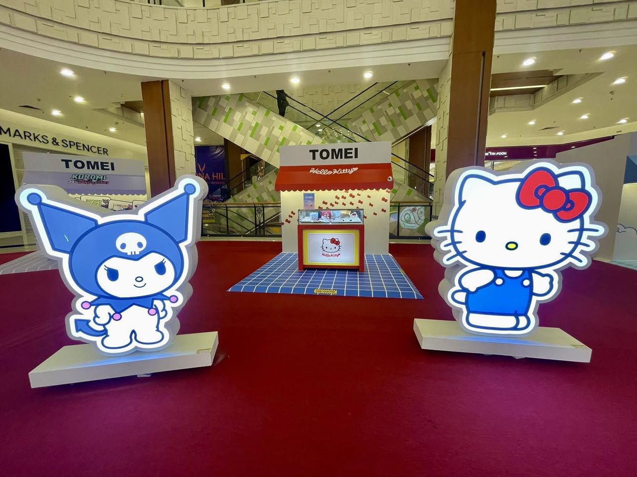 A whimsical Sanrio themed photo booth setup