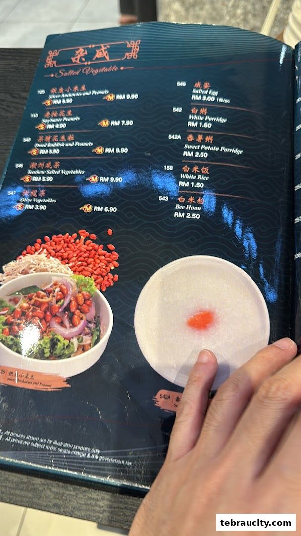 A menu from Restaurant Chao Shan Aeon Tebrau featuring various salted vegetables and porridges.