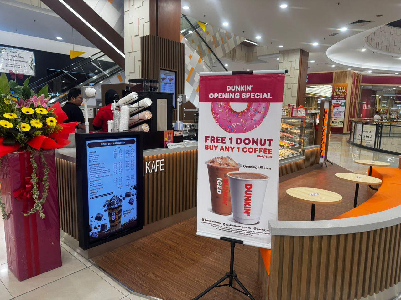 Interior shot of the new Dunkin' outlet showcasing a variety of donuts