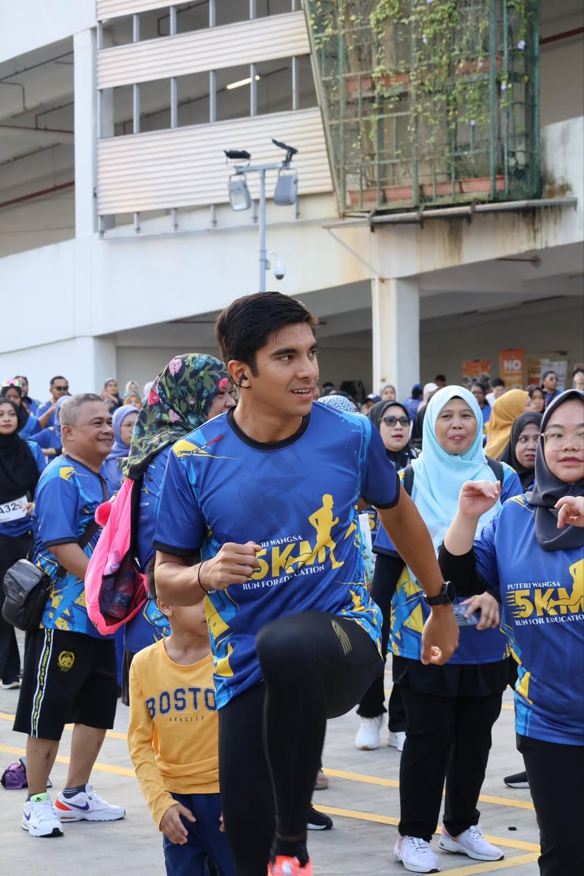 Community members gathering for the Puteri Wangsa 5KM Run for Education 2025