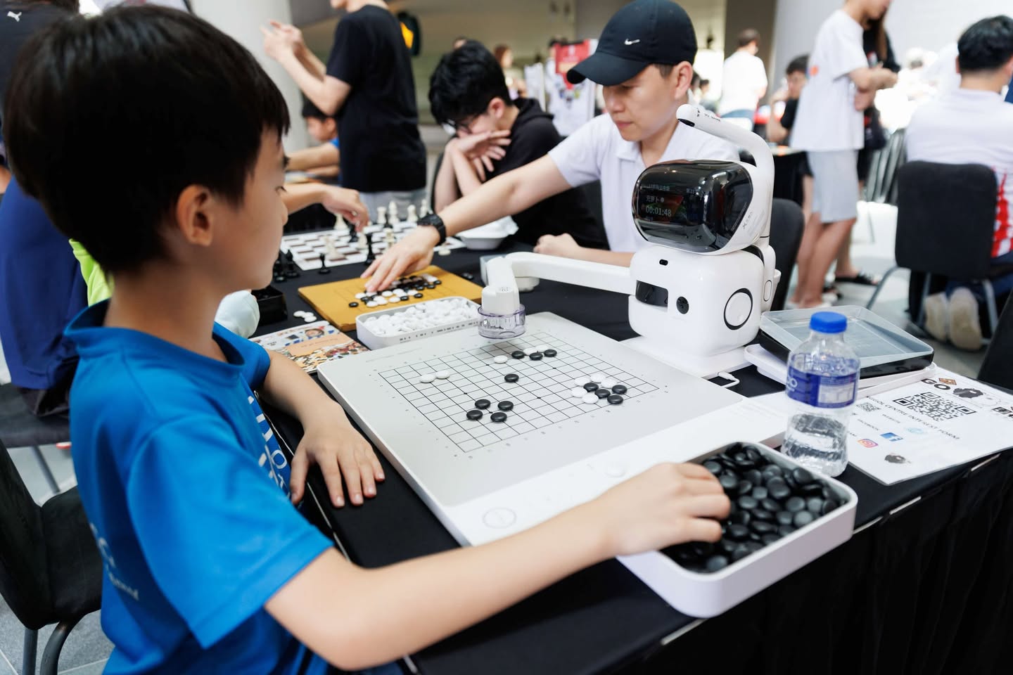 Children playing on bouncy castles and participating in workshops