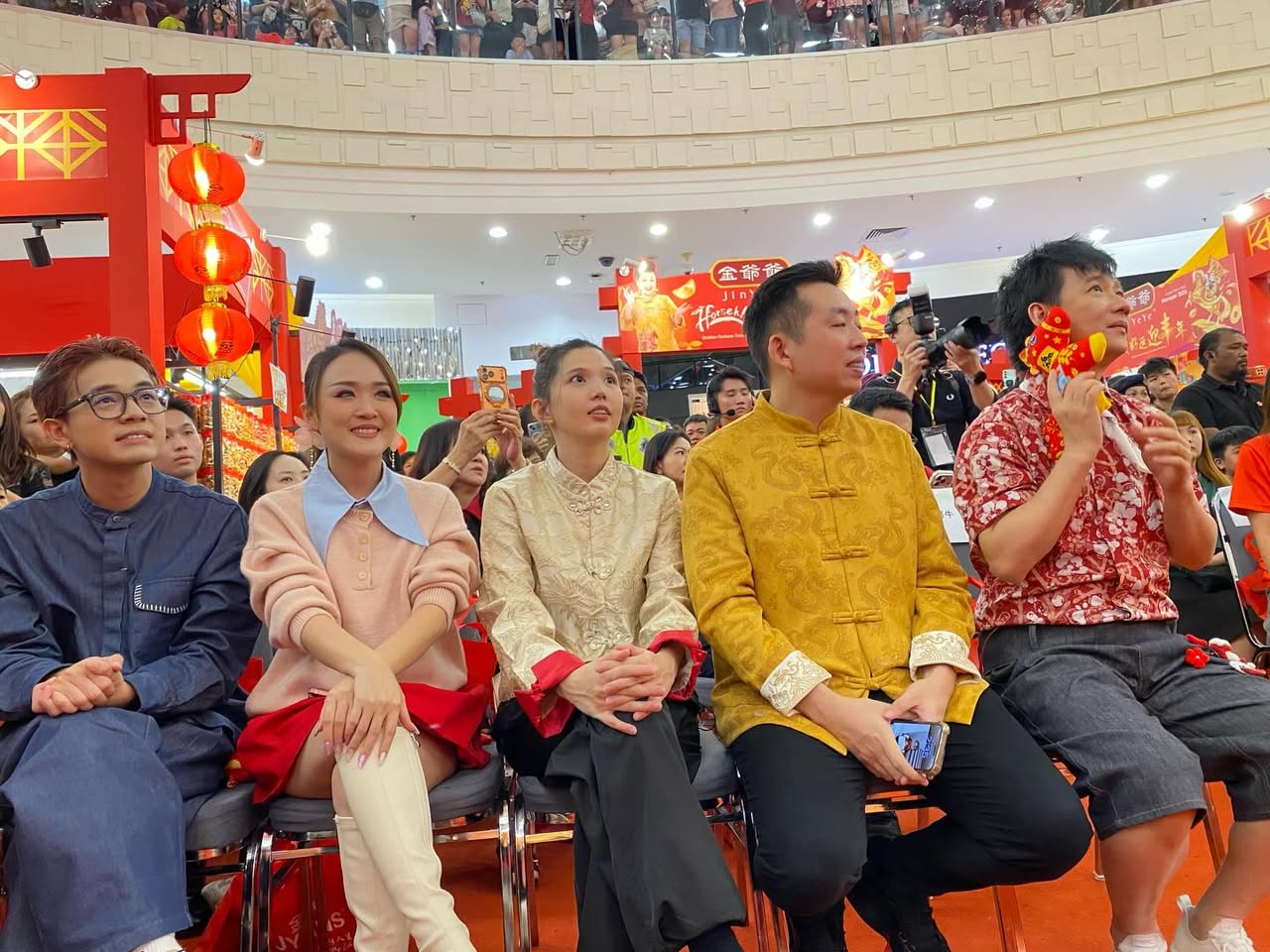 Artists performing on stage during the Lunar New Year celebration